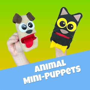 May include: Two felt animal hand puppets, a brown dog and a black cat, with big googly eyes. The puppets are held up by hands and the text "Animal Mini-Puppets" is on a blue background.