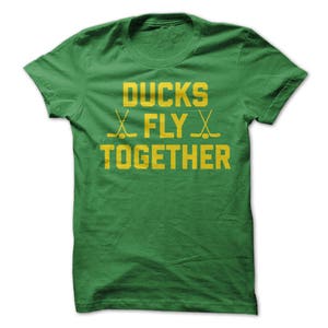 Ducks Fly Together T-Shirt Design - Green T-shirt with Gold Print