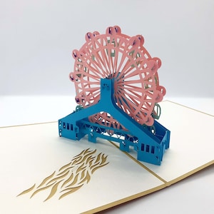 Karta pop-up Kirigami, wycinana laserowo diabelskim młynem