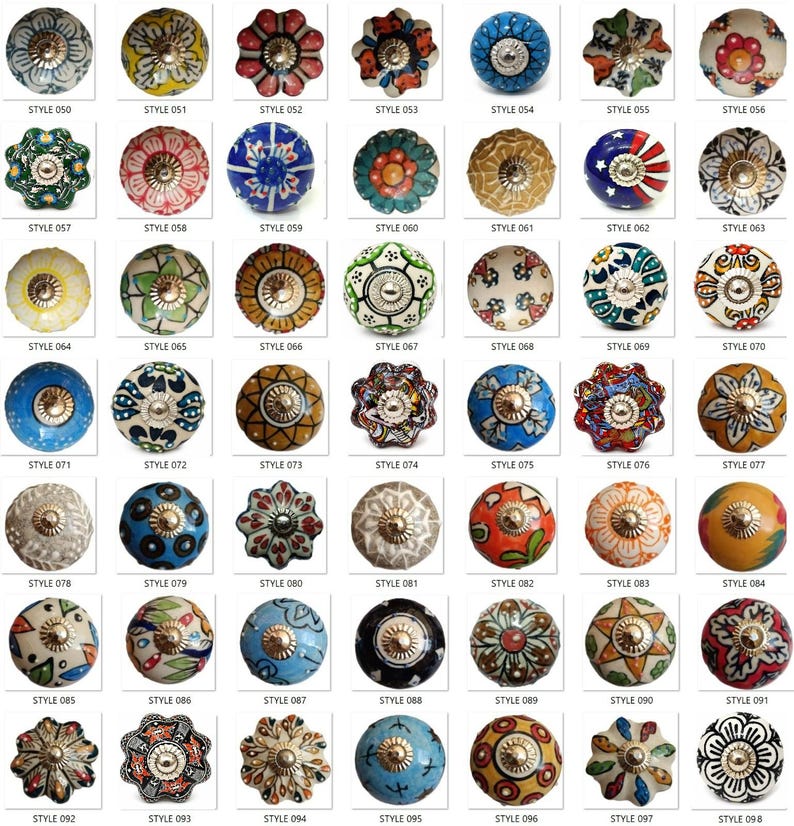 May include: A collection of forty-nine round ceramic cabinet knobs arranged in a grid, each featuring unique hand-painted floral, geometric, or star patterns in various colors, with a central metallic screw head labeled from STYLE 050 to 098.