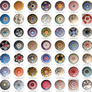 May include: A collection of decorative flat knobs with various colorful designs. The knobs feature floral, geometric, and abstract patterns in a variety of colors, including blue, red, yellow, and green. Each knob is labeled with "FLAT KNOB" and a number.