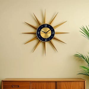 Mid-Century Modern Starburst Wall Clock: Gold & Black Retro Metal Art