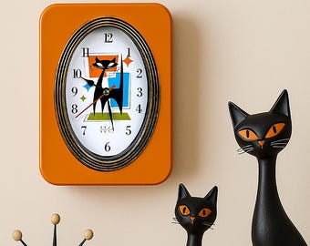 壁掛け時計プラスチック電気 2000。西ドイツ。スペースエイジ。世紀