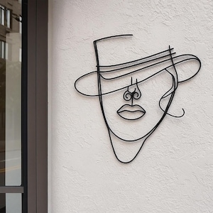 Modern Wire Face Wall Sculpture with Hat: Abstract Steel Line Art