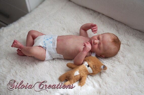 realborn logan sleeping