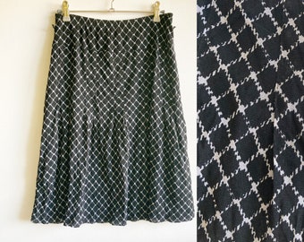 Vintagekjol, Svartvit kjol, Midikjol, Enfärgad kjol, Mönstrad kjol, Klassisk kjol, Enkel kjol, Formell kjol, Storlek L