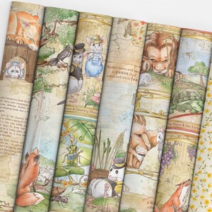 May include: A stack of illustrated paper rolls featuring various animal characters and scenes. The illustrations include a lion, fox, mice, and a tortoise, with text that reads "Better beans and bacon in peace than cakes and ale in fear."
