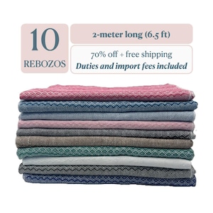 May include: A stack of 10 rebozos, each 2-meter long (6.5 ft), featuring various colors including pink, blue, grey, brown, and green with woven geometric patterns. The text 10 REBOZOS and 2-meter long (6.5 ft) is displayed above the folded fabric stack.