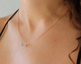 Gold necklace with aquamarine pendants