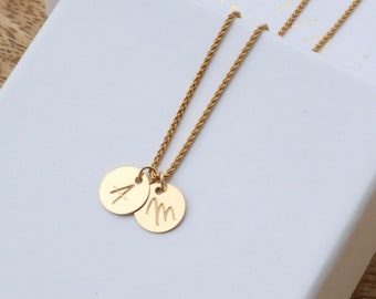 Personalized gold necklace with names and initials