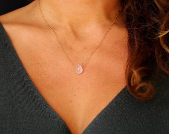 Small rose quartz drop on a delicate gold chain