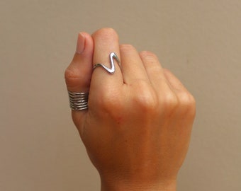 Asymmetrical ring- adjustable ring