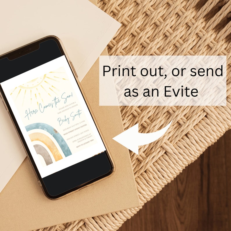 May include: A smartphone displaying a baby shower invitation with a rainbow and sun design. The invitation reads "Here Comes the Sun!" and includes the name "Becky Smith".