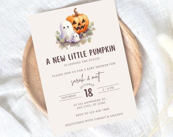 May include: A baby shower invitation with a cute illustration of a pumpkin and two ghosts. The invitation is for Sarah and Matt and is on October 18th from 2-4 PM. The address is 123 Anywhere St., Any City, ST 12345. RSVP to 123-456-7890. Registered with Target & Amazon.