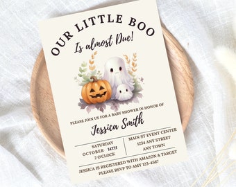 May include: A Halloween-themed baby shower invitation with the text "OUR LITTLE BOO Is almost Due!". The invitation features a watercolor illustration of a pumpkin and two ghosts. The invitation is on a cream-coloured background.