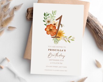 May include: A white invitation card with a watercolour illustration of the number one surrounded by flowers and a bee. The text reads "You are invited to Priscilla's Birthday, September 15th, 2 O'clock PM, 1234 Any Street, Any Town, Please RSVP to Audrey (123456-7890".