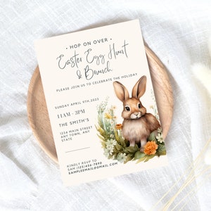 May include: An invitation to an Easter Egg Hunt and Brunch. The invitation features a cute cartoon bunny rabbit surrounded by flowers and greenery. The text on the invitation reads "Hop on Over. Easter Egg Hunt & Brunch. Please join us to celebrate the holiday. Sunday April 9th, 2023. 11AM-3PM. The Smith's. 1234 Main Street. Any Town, Any State. Kindly RSVP to Sam (123)456-7890. Sampleemail@gmail.com"