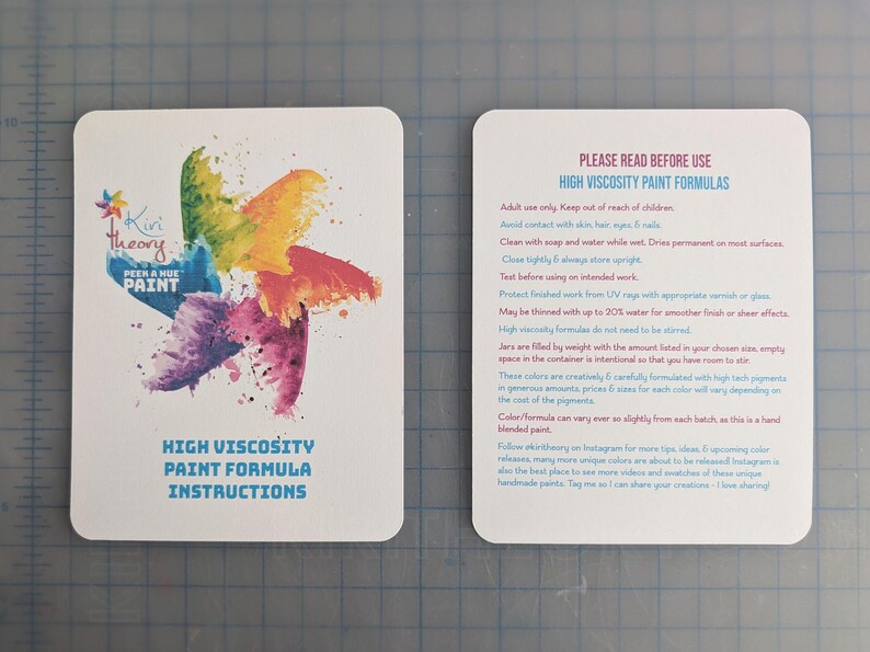 Instruction cards for Kiri Theory High Viscosity formula paint.  One card shows a colorful starburst logo design with the brand name and product name. The other card provides detailed instructions for use which can also be found in the listing description, and which will be included with each order.