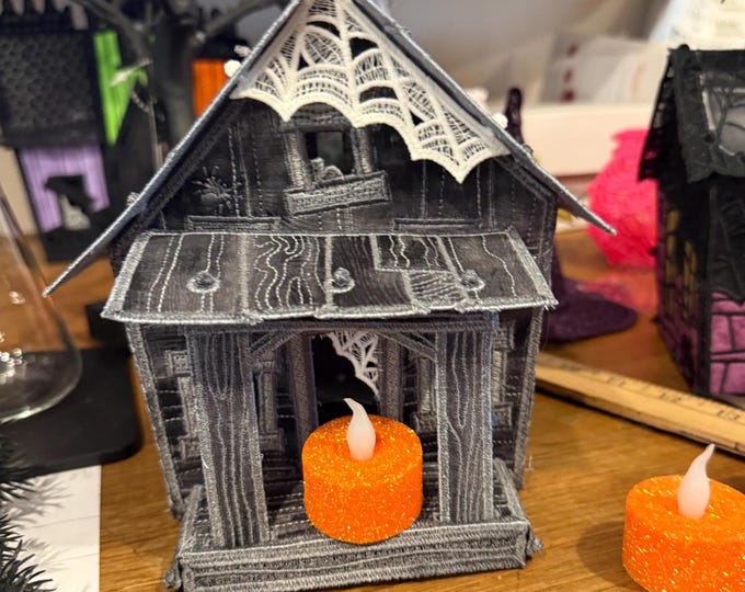 Haunted Shack Halloween Decor: Spooky Tea Light Included with glow in the dark spiders