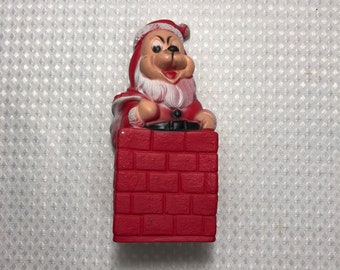 squeeze bulb jumping frog toy