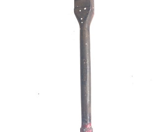 May include: A vintage Craftsman brand drill bit with a metal handle and a red tip. The drill bit has a unique design with a metal wing on each side.
