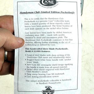 May include: A certificate of authenticity for a Handyman Club Limited Edition Pocketknife. The document details the knife's features, including surgical steel blades, a burnt white bone handle, and a nickel silver shield. The knife is handmade in Bradford, Pennsylvania.