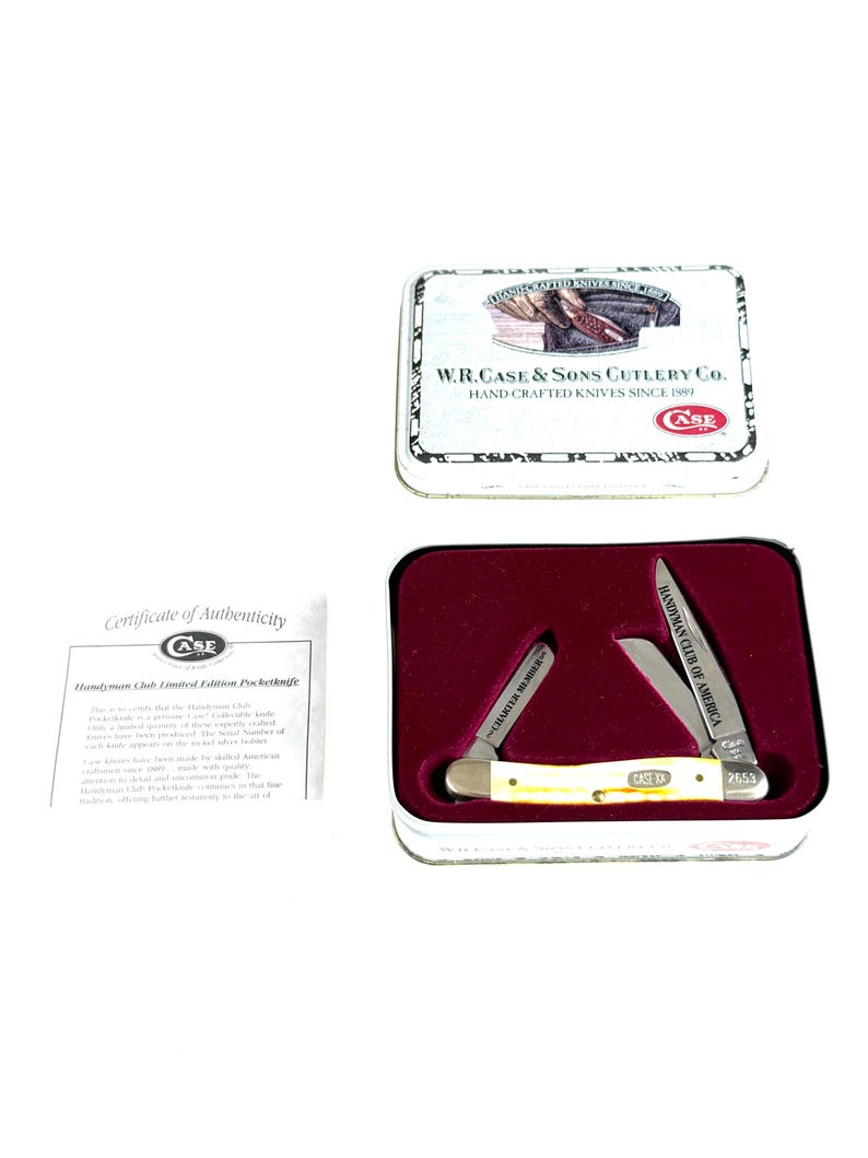 May include: A limited edition Case pocketknife set. The set includes a knife with a cream-colored handle, two blades, and the text "CASE RA 2653". The set comes in a metal tin with the text "W.R. Case & Sons Cutlery Co."