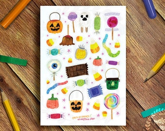 May include: A sheet of Halloween-themed stickers featuring various candies, pumpkins, ghosts, and a candy bucket. The stickers are colorful with a cartoon style, set against a wooden background. Text on the sheet reads "Trick or Treats" and "by Melanie Jean".