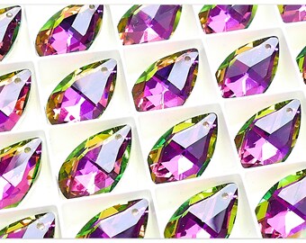 May include: A collection of iridescent purple and green teardrop-shaped crystal beads with a hole at the top for stringing.