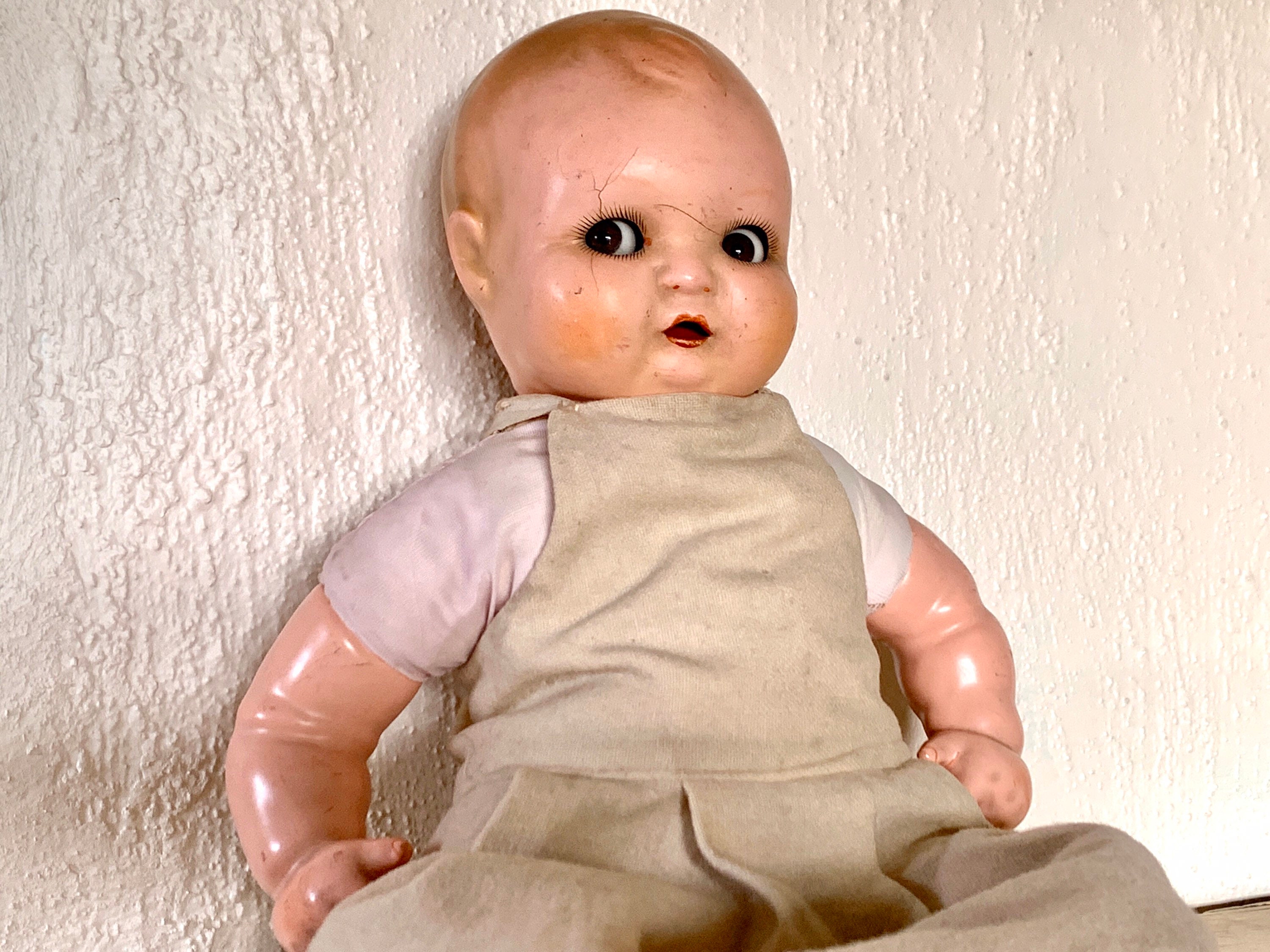 baby doll with closing eyes