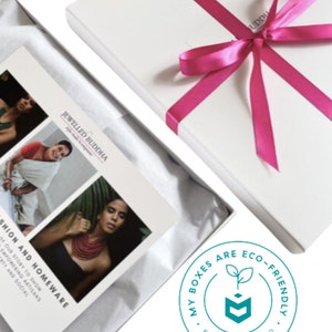 Eco-friendly white gift box with pink ribbon by ethical fashion brand Jewelled Buddha