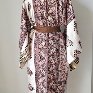 Back view of decorative pink paisley floral kimono robe