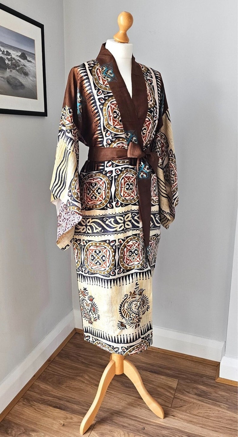Africa Tribal Print Silk Kimono Robe in Chocolate With bold floral and geometric motifs.
