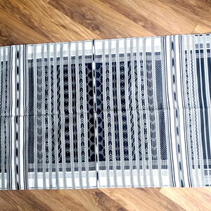 Rajasthani handwoven striped rug with tribal geometric print