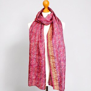Pretty pink silk scarf with a gold border crafted from recycled sari silk and upcycled with Kantha running stitch to create a lightly quilted look.