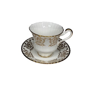 Vintage Paragon Fine Bone China England Gold White Teacup And Saucer