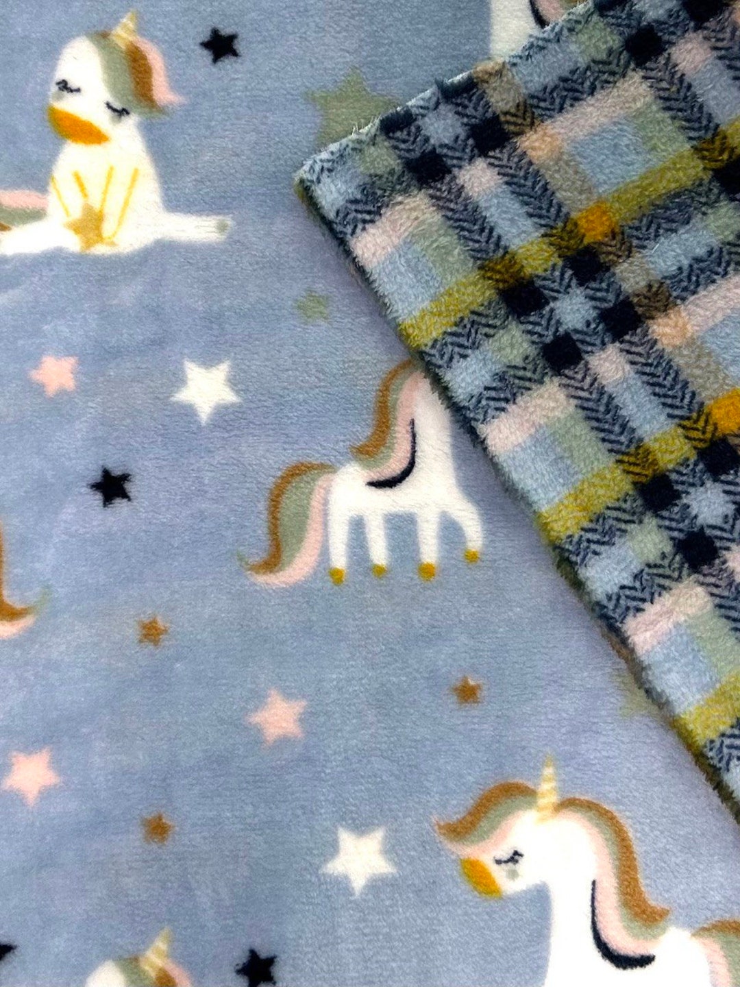 Fleecestoff Teddy Einhorn hellblau beidseitig Breite 150 cm ab