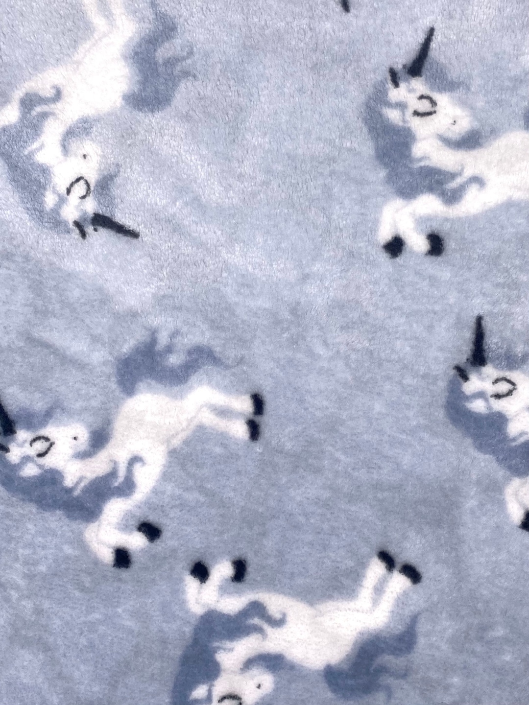 Rest 0,95m Fleecestoff Teddy Einhorn hellgrau doppelseitig Breite