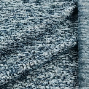Tecido de lã tricotado manchado de azul escuro
