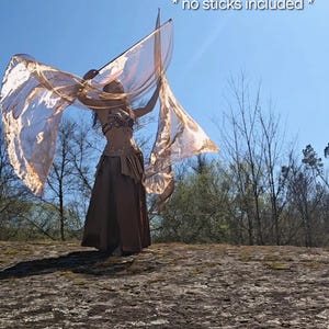 Asas de fada, asas de flores, asas de véu