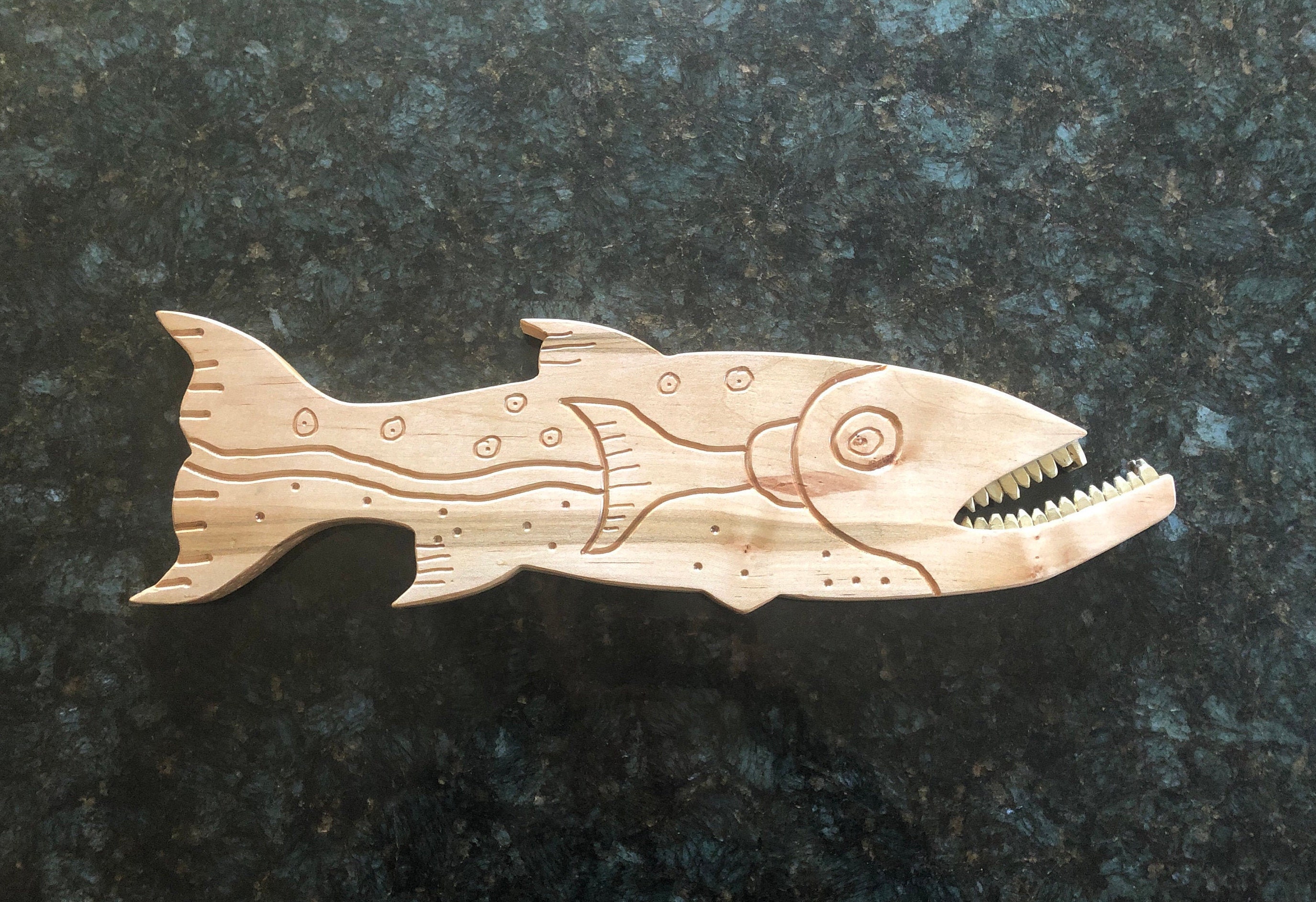 Carved wood fish wall art with brass teeth Etsy