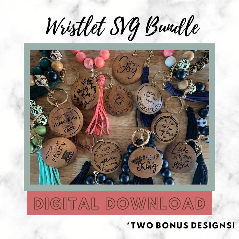 May include: A collection of 10 wooden wristlet keychains with various engraved sayings. The keychains are decorated with black and white beads, and some have colorful tassels. The sayings include "Pray Big", "Choose Joy", "It's a Great Day to Have a Great Day", "Another Fine Day Ruined by Responsibility", "I Don't Need a Mood Ring I Have a Face", "Write Your Story", "Killin' This Mom Thing", "Just Hiding I'm a Mess", "Daughter of a King", and "Live Like Someone Left the Gate Open".