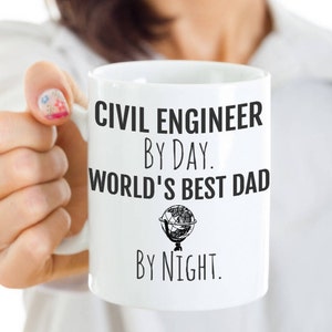 May include: White ceramic mug with black text that reads "Civil Engineer by Day. World's Best Dad by Night." A small globe graphic is between the two lines of text.