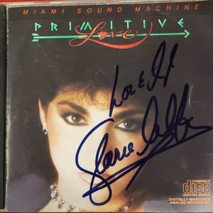 Gloria Estefan Miami Sound Machine "Primitive Love" CD Hand-Signed Autographed by Gloria Estefan w/ LOA