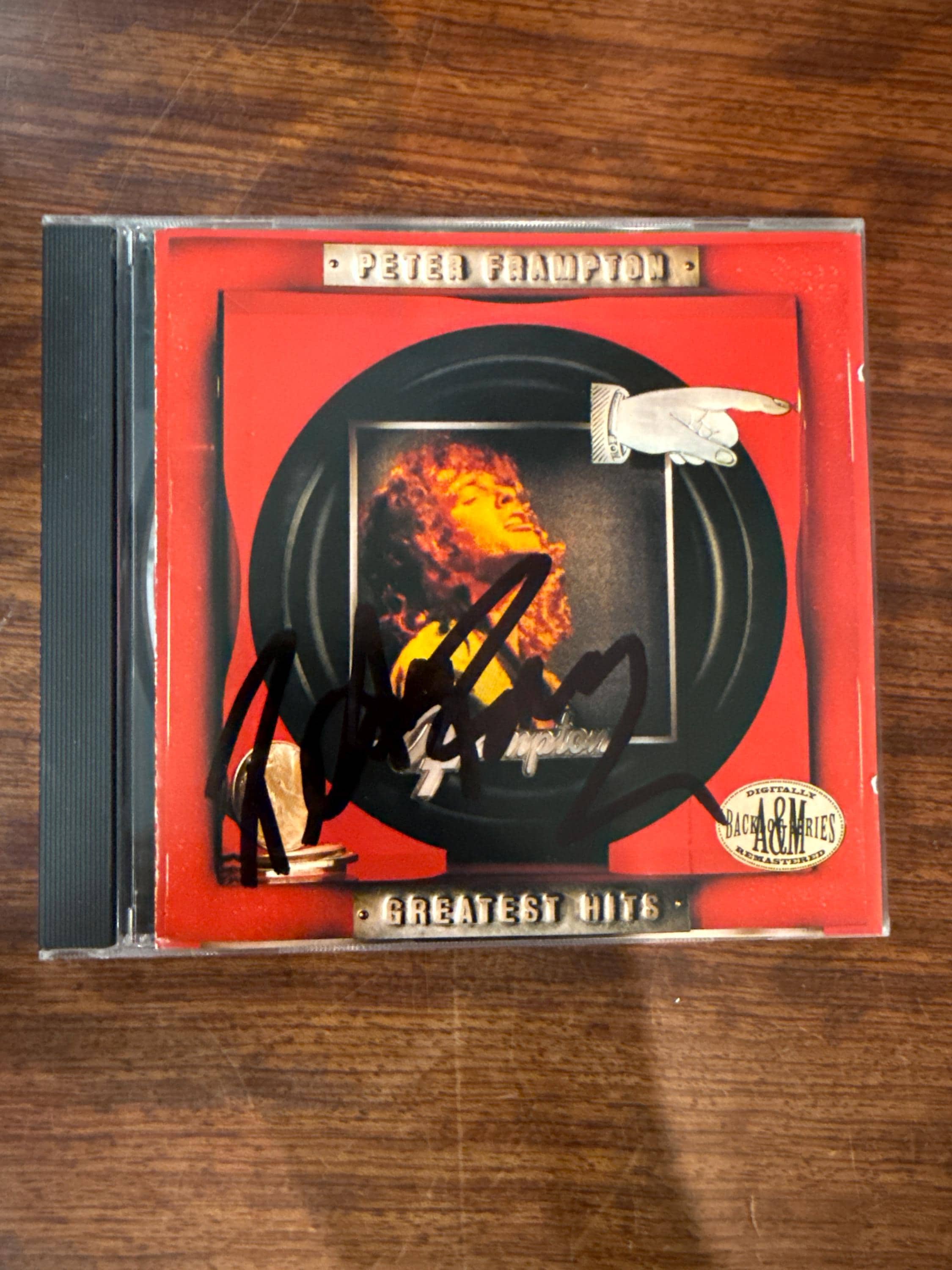 Peter Frampton "Greatest Hits" CD Hand Signed Autograped by Peter Frampton w/ LOA