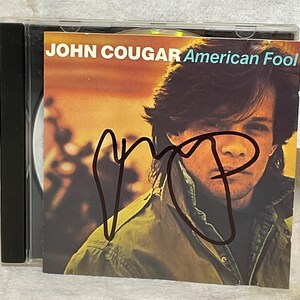 John Cougar Mellencamp "American Fool" CD Hand Signed Autographed by John Mellencamp W/ LOA Hologram