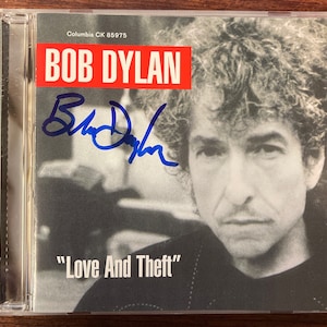 Bob Dylan Love and Theft-cd-album, gesigneerd, met de hand ondertekend, in blauwe stift met LOA
