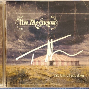 CD autografiado con letra de identificación de Tim McGraw &quot;Set This Circus Down&quot;