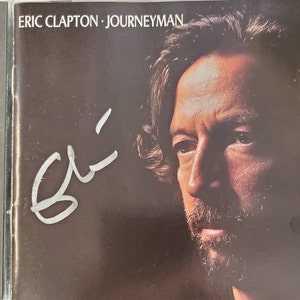 Album CD Erica Claptona Journeyman z autografem Erica Claptona i LOA