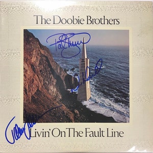 The Doobie Brothers Livin On The Fault Line Record Album Hand Signed by Patrick Simmons Michael McDonald Tom Johnston In Blue Ink w/ LOA